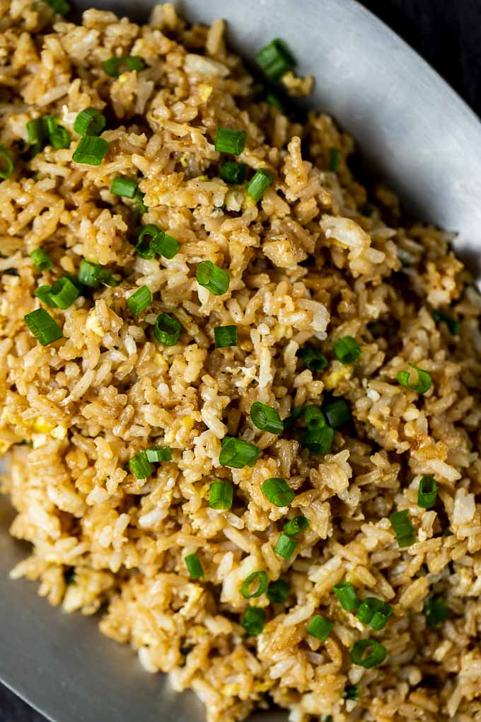 close up photo of fried rice with green onions