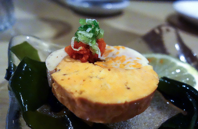 best sushi in san diego, monkfish liver with garnish on top