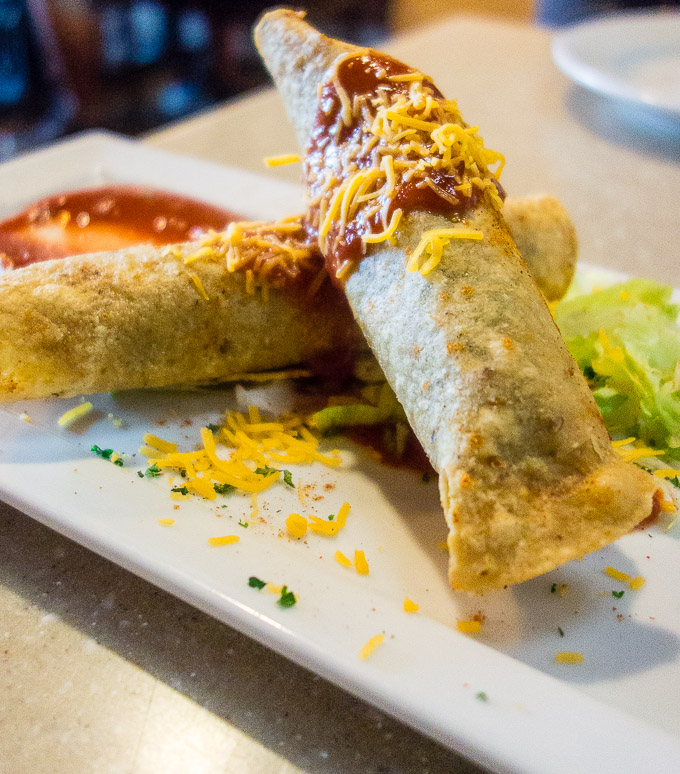 best cajun food in downtown san diego, cajun egg rolls on a place with house made picante sauce, lettuce and cheese