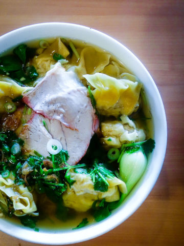 bowl of soup with noodles and wontons and green onion, best vietnamese restaurants in san diego