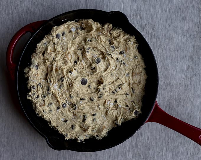 raw cookie dough in a skillet