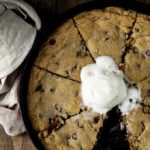 cookie cooked in a skillet topped with ice cream