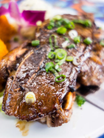 close up of marinated kalbi ribs at matua's sushi bar and islander grill