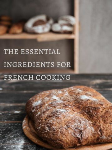 background of baked bread with wording essential ingredients for french cooking