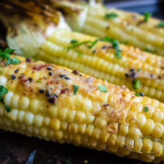 close up of grilled corn with miso butter