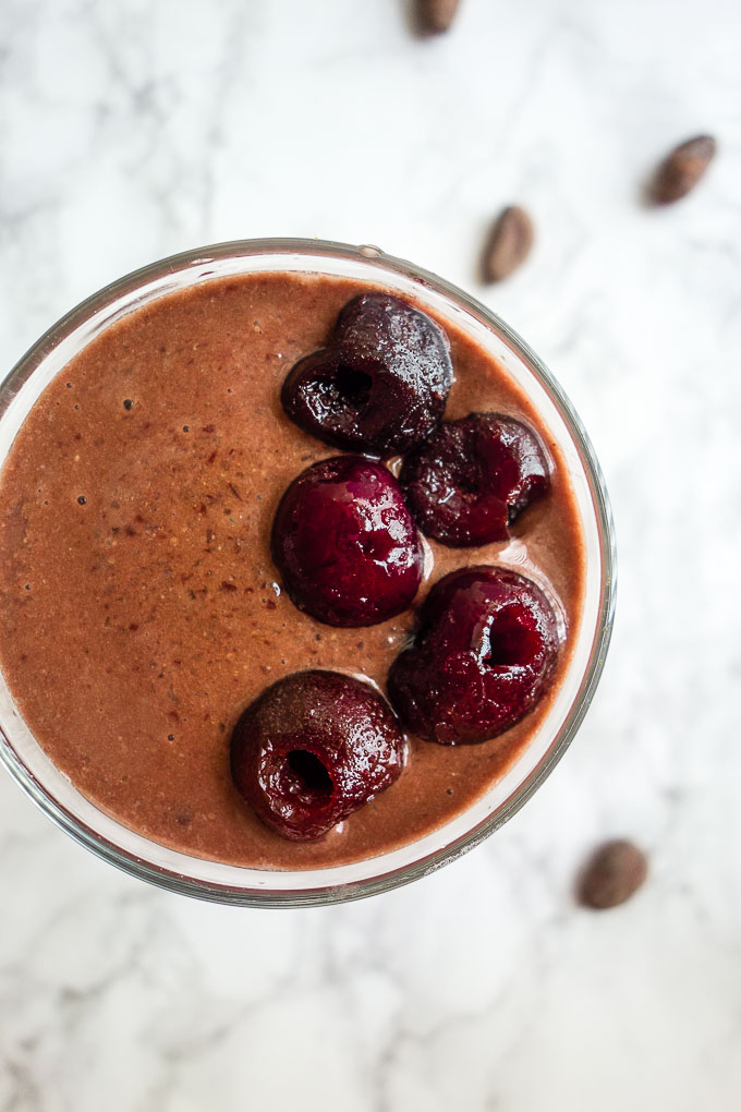 brown chocolate smoothies with cherries on top