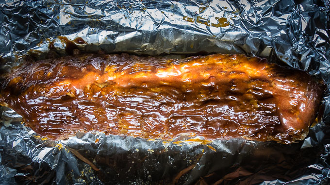 ribs with bbq sauce on foil
