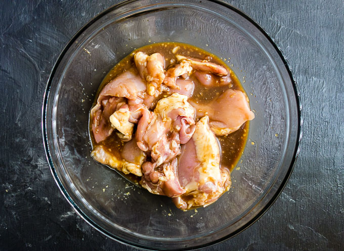 chicken in marinade in a bowl