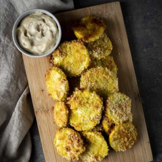 platter of fried squash with white dipping sauce