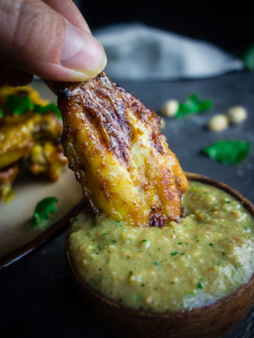 chicken wing dipped in thai peanut sauce