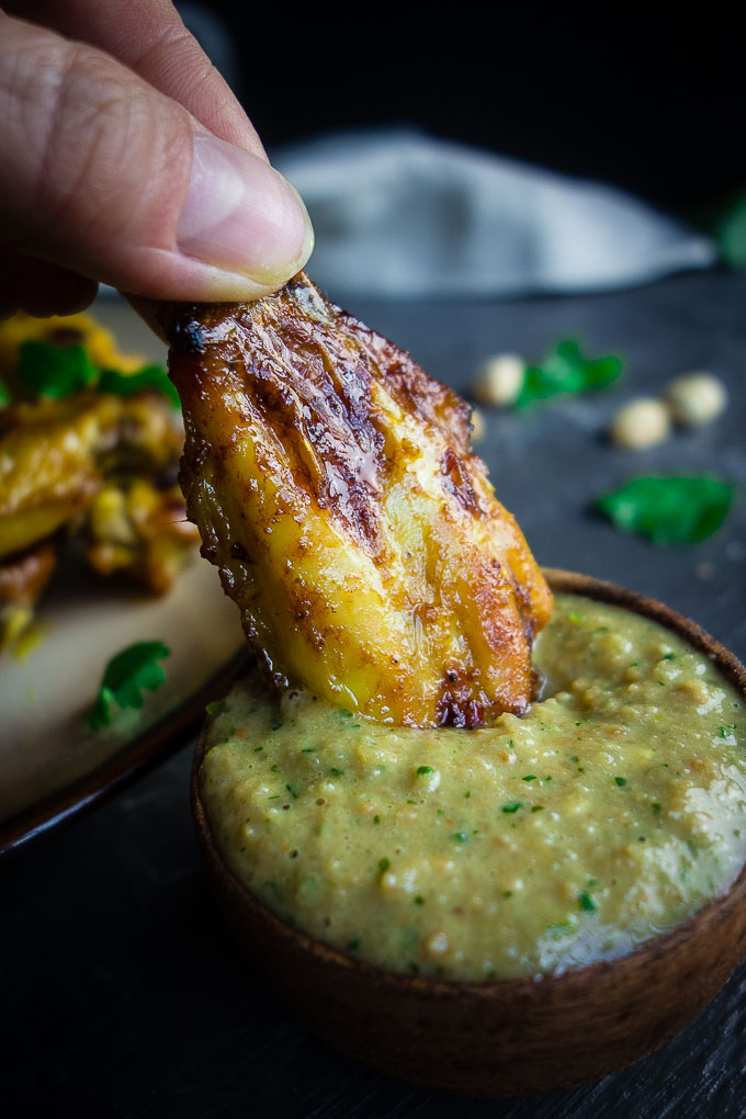 chicken wing dipped in thai peanut sauce