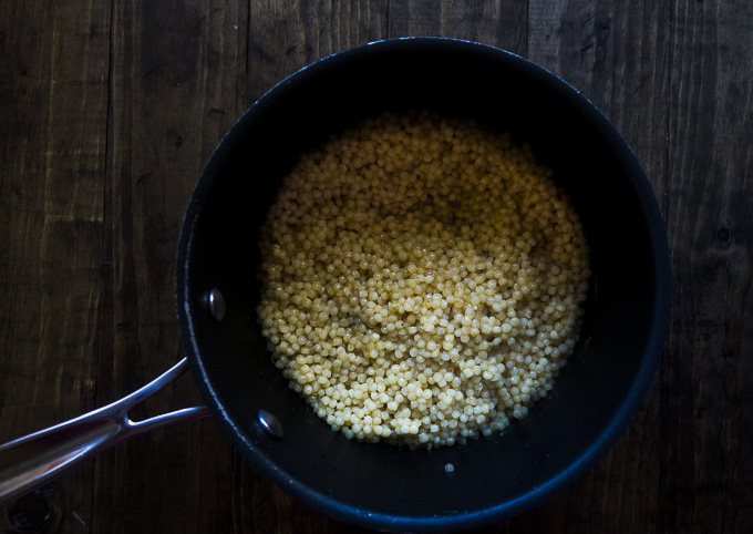 cooked israeli couscous in a saucepan