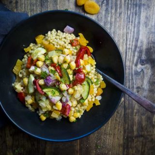 bowl of couscous salad with chickpeas