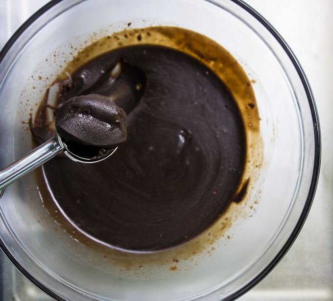 spoon of dark chocolate truffle filling