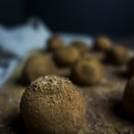 dark chocolate truffles on a board-food photography