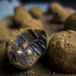 the inside of a dark chocolate truffle