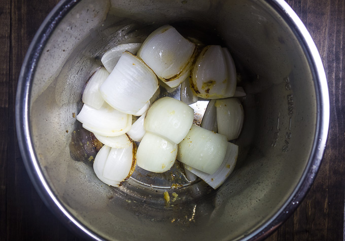 charred onions and ginger in instant pot for pho ga recipe