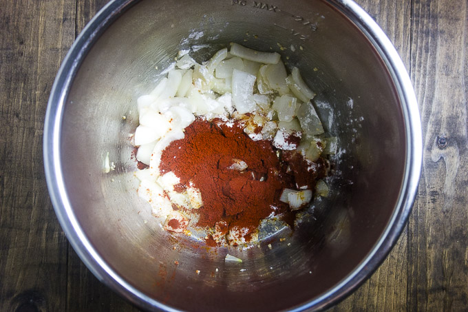 diced onions and paprika in a pot