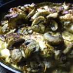 stuffed chicken breast recipe with mushrooms in a skillet