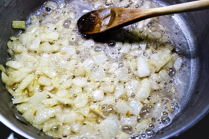 onions frying in a skillet