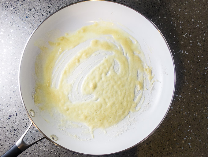 butter and flour in a skillet to make roux