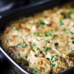 baking dish filled with scalloped potatoes