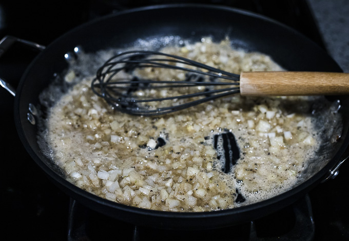 roux and onions in a skillet