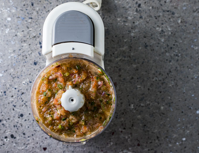 food processor with salsa in it