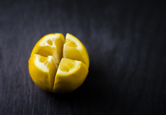 lemon sliced in quarters