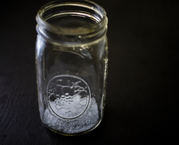 salt in the bottom of a glass jar