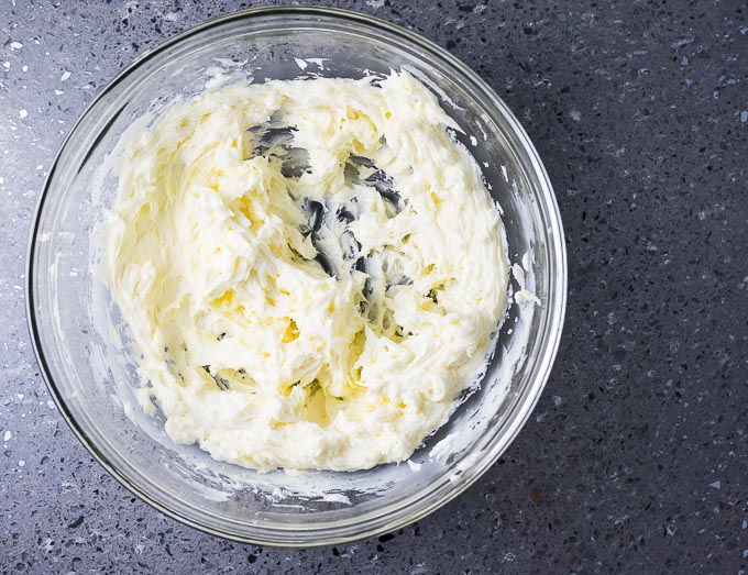 creamed butter and sugar in a glass bowl