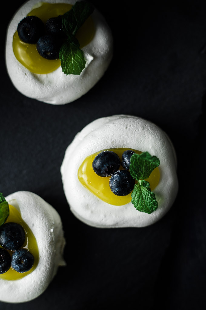 meringue cookies filled with lemon curd and blueberries