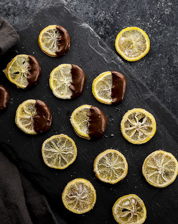 lemon slices on a plate dipped in chocolate
