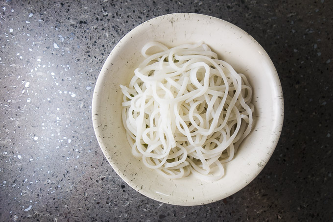 cooked rice noodles in a bowl