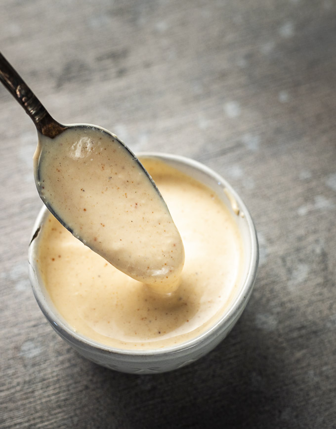 spoon coated with cajun remoulade sauce