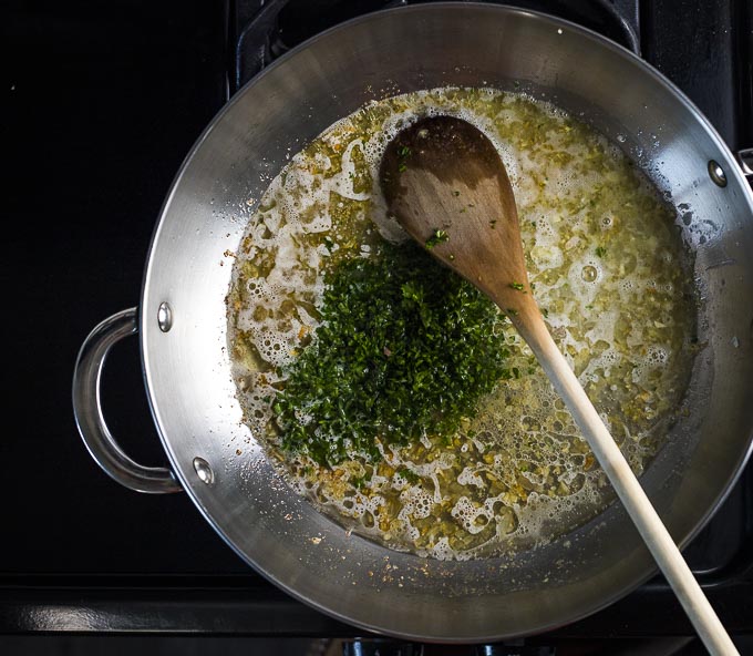 butter and parsley in a saute pan