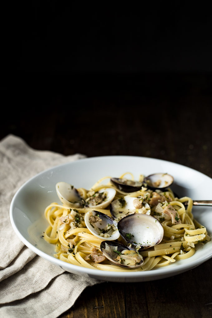 linguine with clams in a white bowl