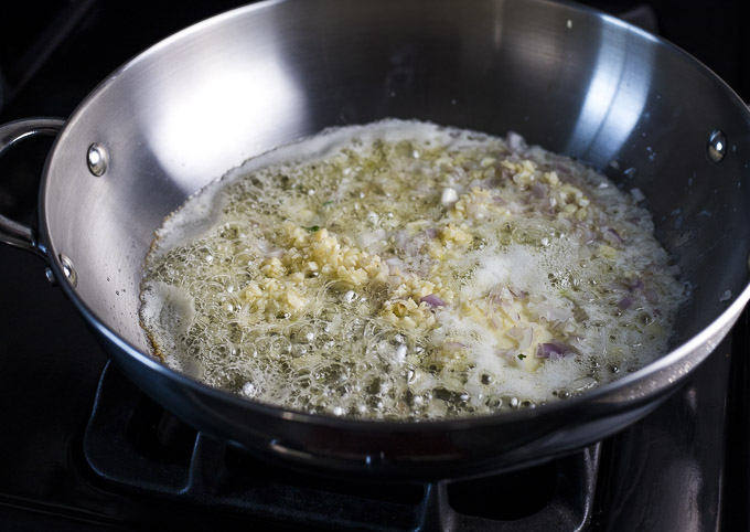 garlic and shallot sauteing in butter