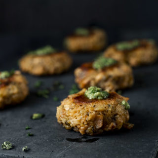salmon cakes on a platter - side view