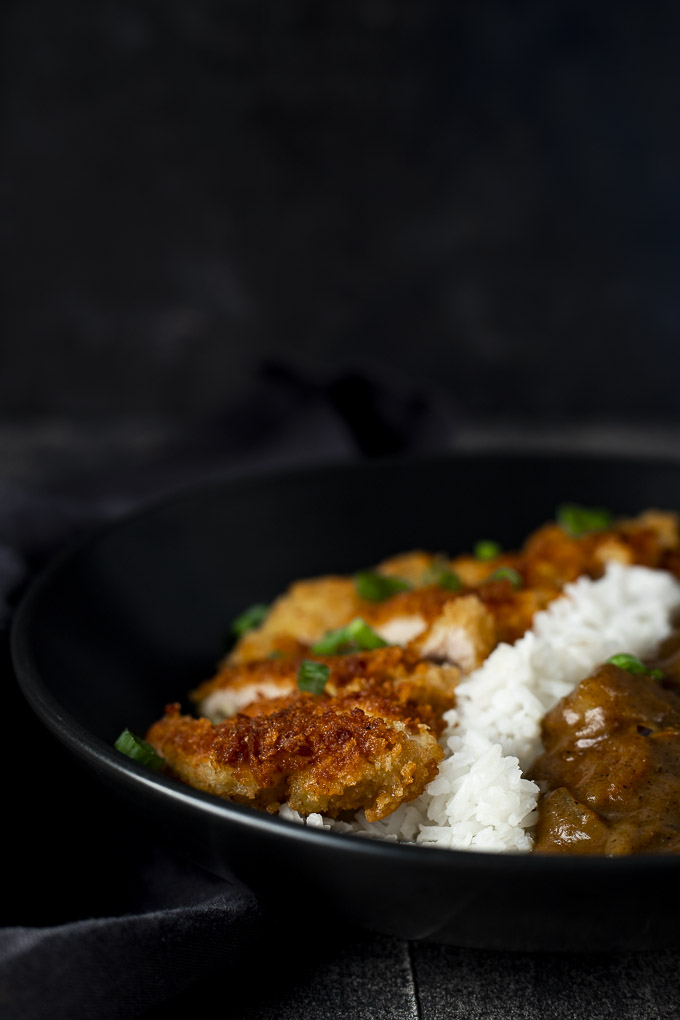 chicken katsu curry in a bowl with rice