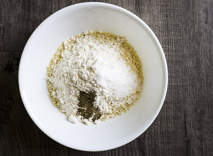 breadcrumbs, flour and seasonings in a bowl
