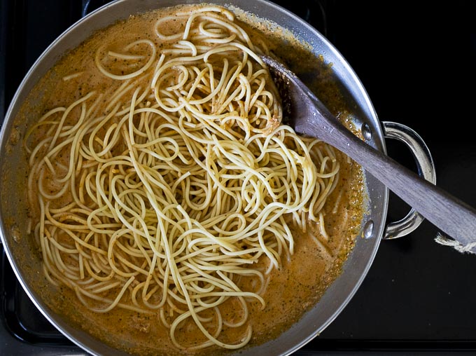 pasta in sauce in a skillet