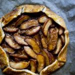 full baked apples galette on parchment paper