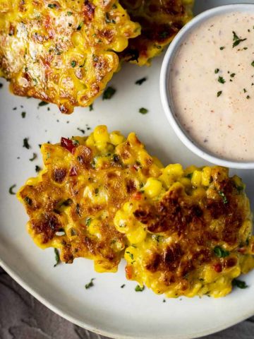 crispy corn fritters on a plate