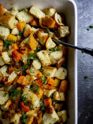 baking dish filled with stuffing made with butternut squash