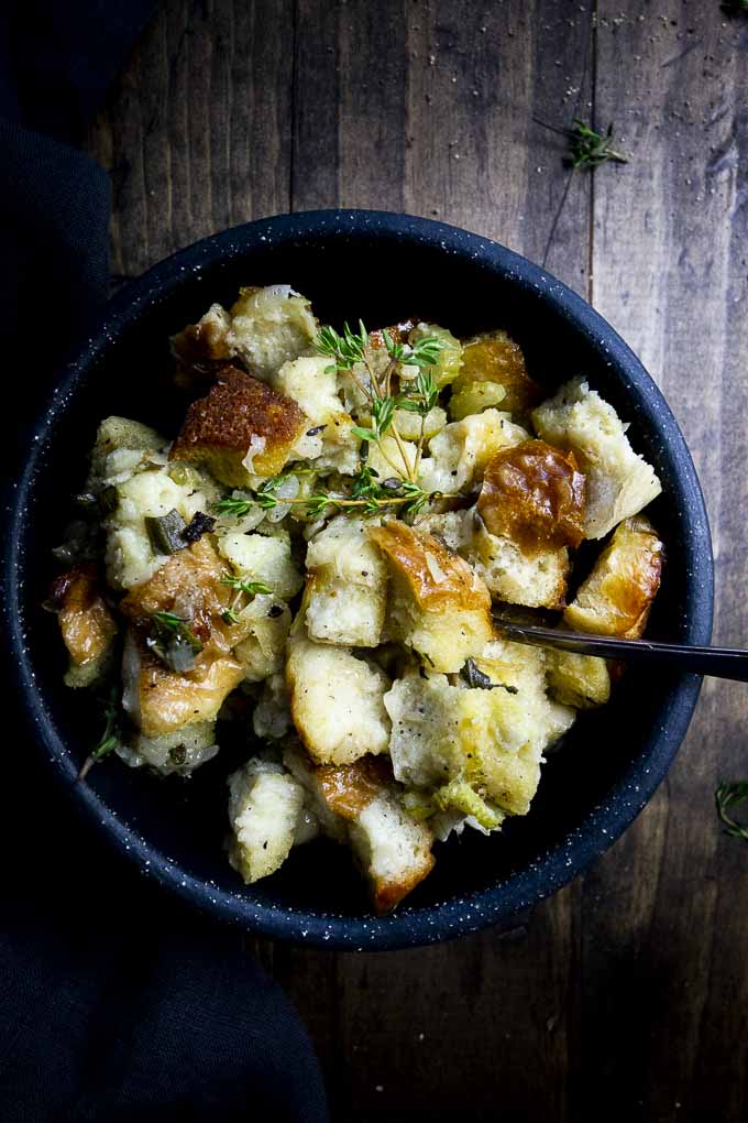bowl of bread stuffing with a spoon