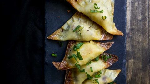 stuffed wontons on a serving platter