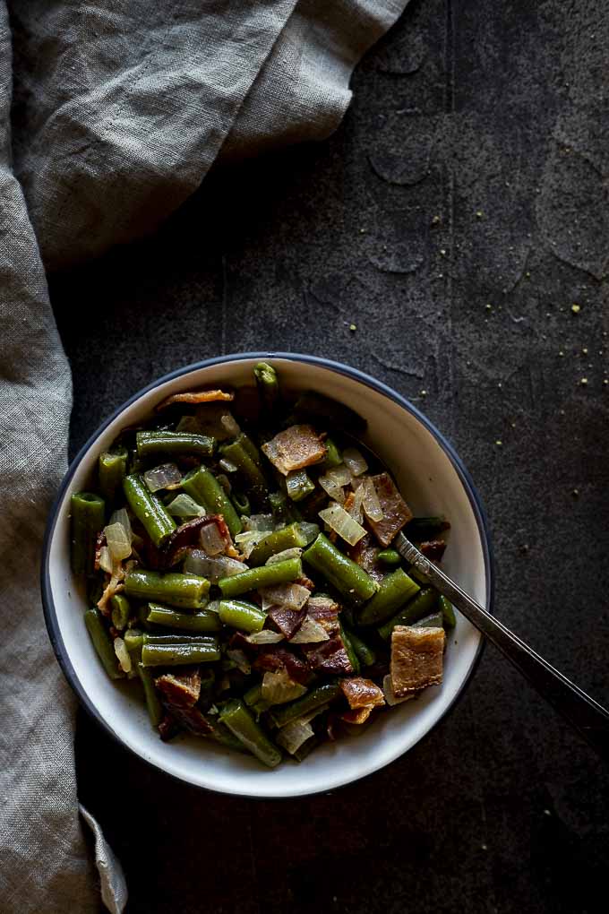 bowl of bacon green beans with onions
