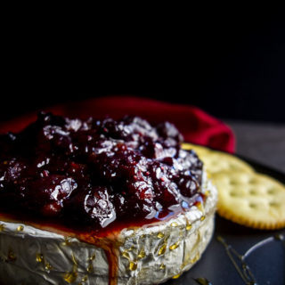 cranberry chutney on baked brie with crackers