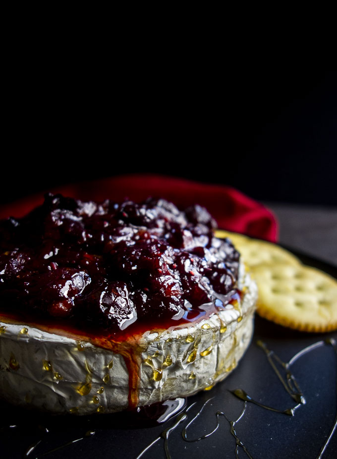 cranberry chutney on baked brie with crackers